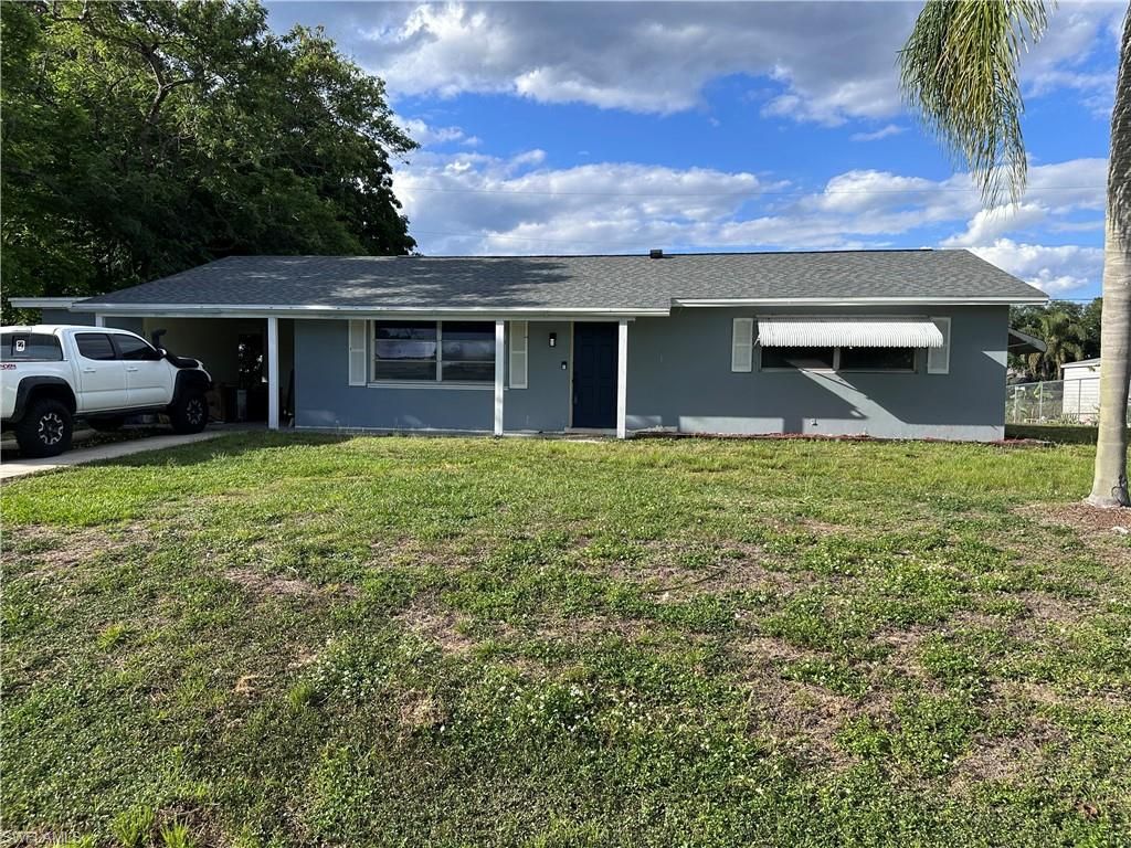 13 E Jasmine RD, Lehigh Acres, FL 33936