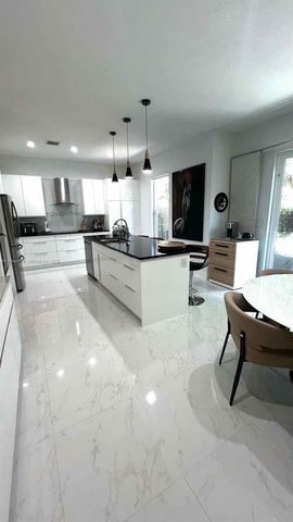 6923 Julia Gardens Dr, Coconut Creek, FL 33073