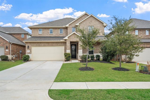 2157 Woodland Pine Drive, Conroe, TX 77384