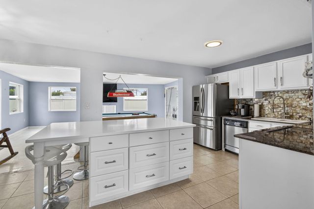 9141 Birmingham Drive, Palm Beach Gardens, FL 33410