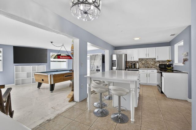 9141 Birmingham Drive, Palm Beach Gardens, FL 33410