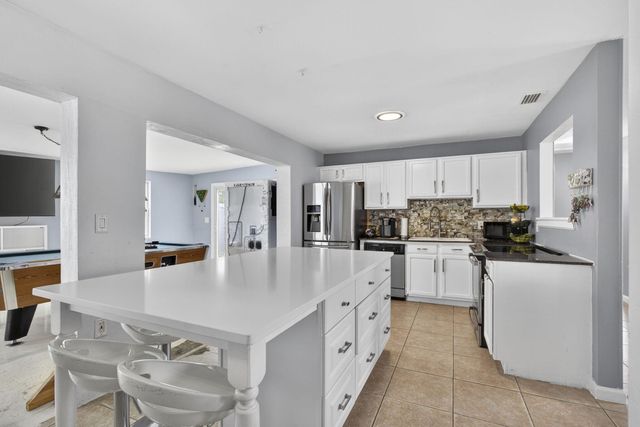 9141 Birmingham Drive, Palm Beach Gardens, FL 33410