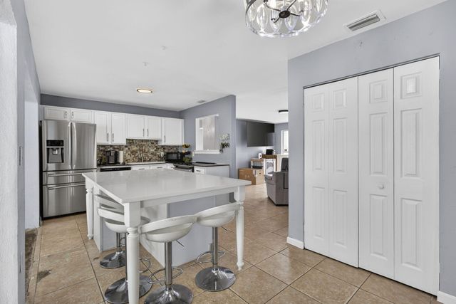 9141 Birmingham Drive, Palm Beach Gardens, FL 33410