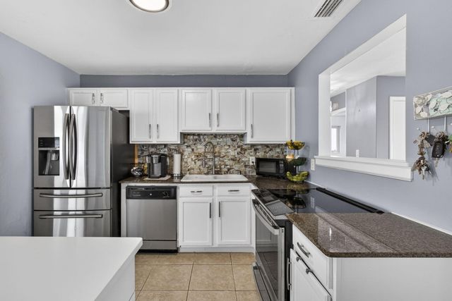 9141 Birmingham Drive, Palm Beach Gardens, FL 33410