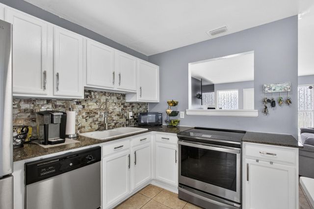 9141 Birmingham Drive, Palm Beach Gardens, FL 33410