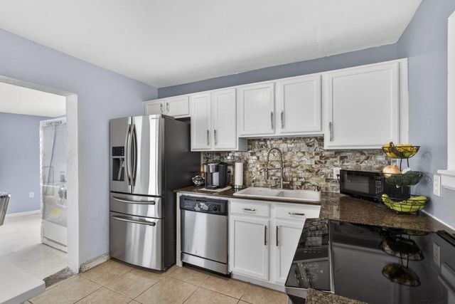 9141 Birmingham Drive, Palm Beach Gardens, FL 33410