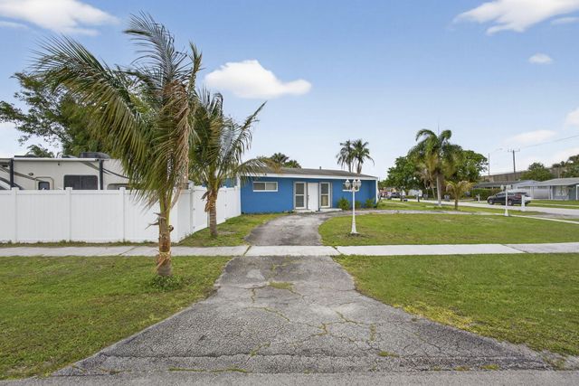 9141 Birmingham Drive, Palm Beach Gardens, FL 33410