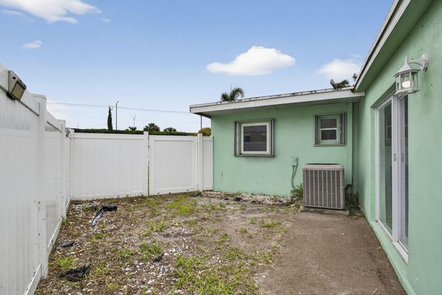 9141 Birmingham Drive, Palm Beach Gardens, FL 33410