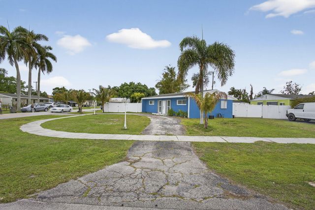 9141 Birmingham Drive, Palm Beach Gardens, FL 33410