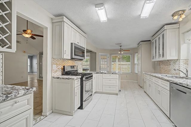 3927 Village Well Drive, Humble, TX 77396