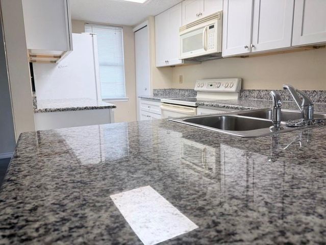 7514 COLONIAL COURT, Tampa, FL 33615