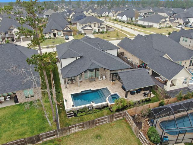 1067 Lakemont Bend Lane, Pinehurst, TX 77362