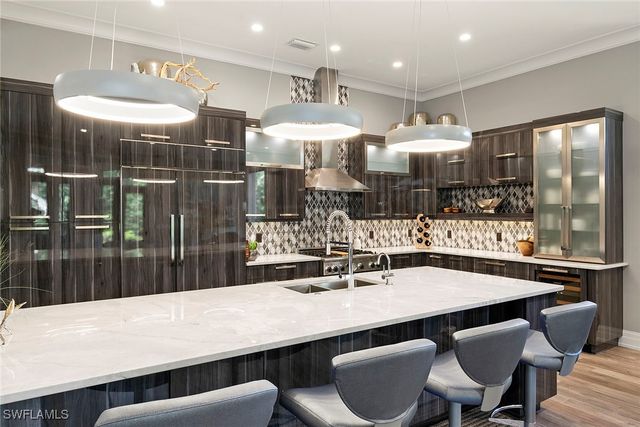 927 Barcarmil WAY, Naples, FL 34110