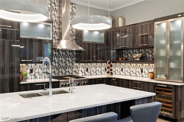 927 Barcarmil WAY, Naples, FL 34110