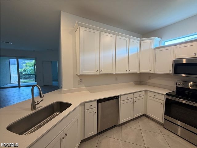 9077 Leatherwood LOOP, Lehigh Acres, FL 33936