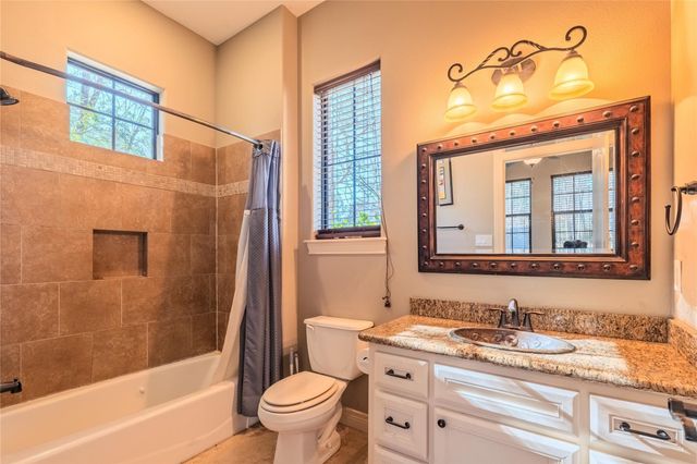 11409 Oak Springs Drive, Willis, TX 77378