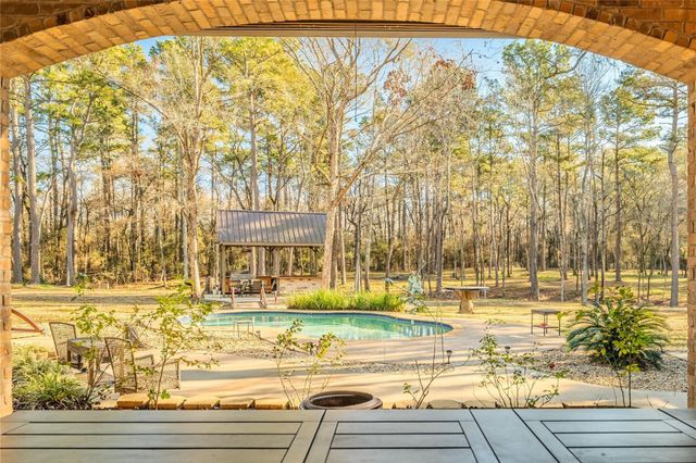 11409 Oak Springs Drive, Willis, TX 77378