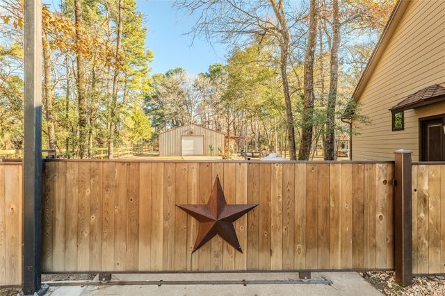 11409 Oak Springs Drive, Willis, TX 77378