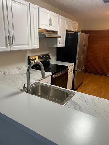 3340 Torremolinos Avenue A-40, Doral, FL 33178