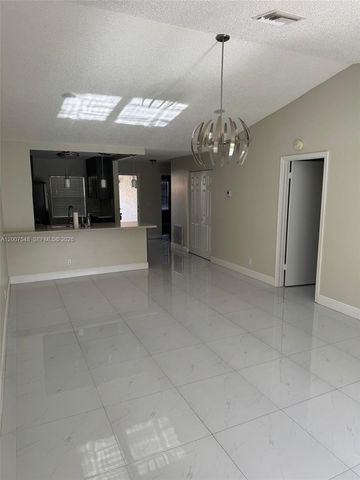 9863 Three Lakes Circle, Boca Raton, FL 33428