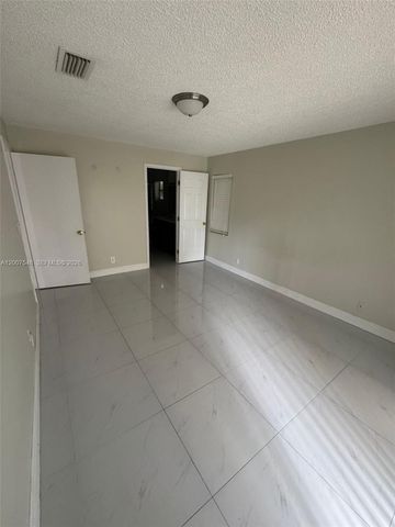 9863 Three Lakes Circle, Boca Raton, FL 33428