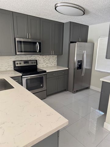 9863 Three Lakes Circle, Boca Raton, FL 33428