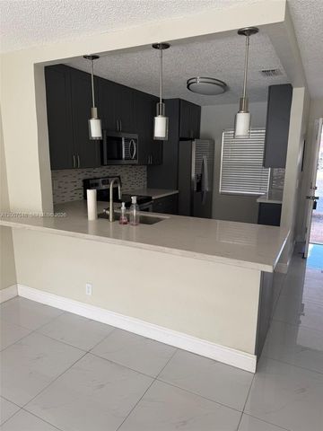 9863 Three Lakes Circle, Boca Raton, FL 33428