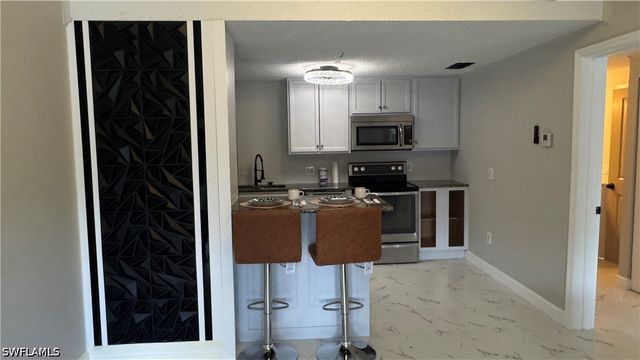 5222 TREETOPS DR, Naples, FL 34113