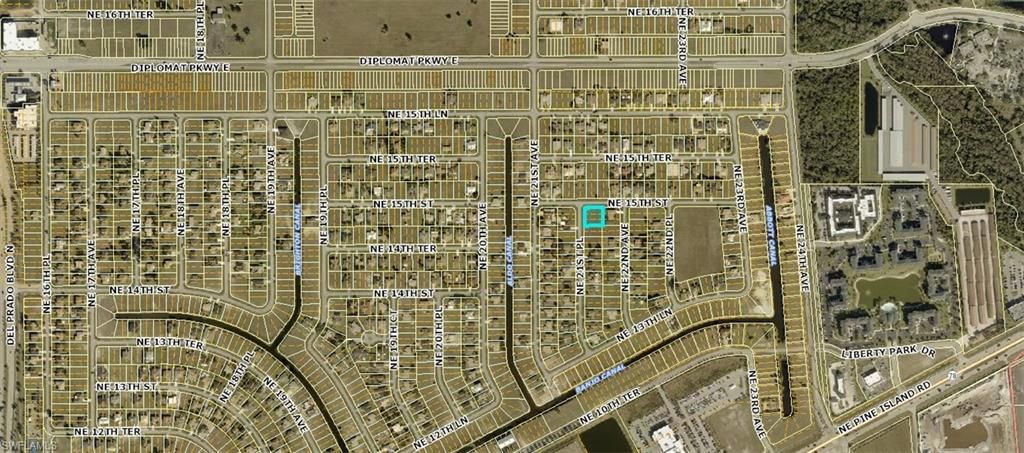 Image 3 of property listing at 1425 21st PL, Cape Coral, FL 33909