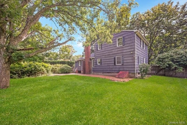 9 Half Moon Pond Road, Ridge, NY 11961
