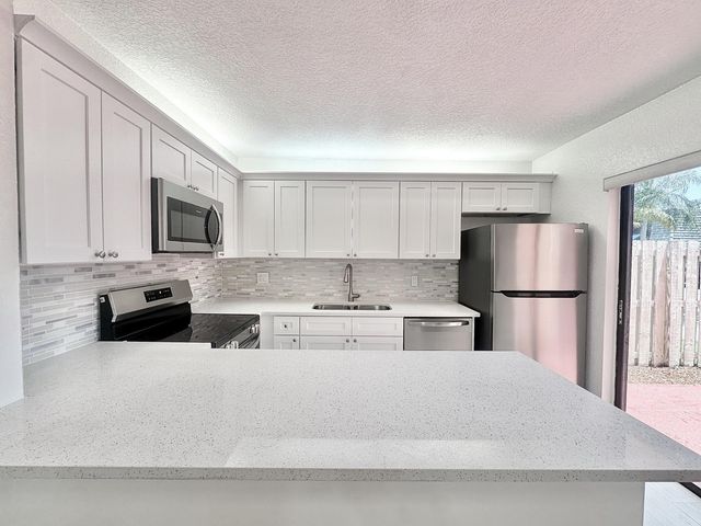 255 Lake Arbor Drive, Palm Springs, FL 33461