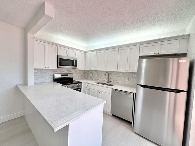 255 Lake Arbor Drive, Palm Springs, FL 33461