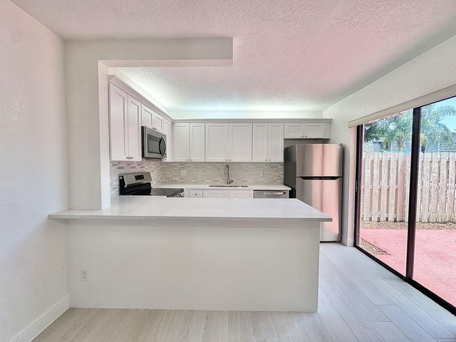 255 Lake Arbor Drive, Palm Springs, FL 33461