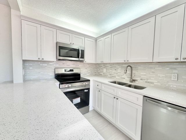 255 Lake Arbor Drive, Palm Springs, FL 33461