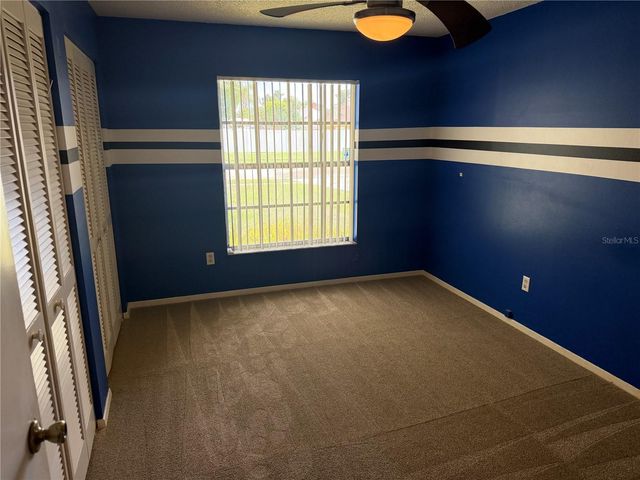 7131 HOLLOWELL DRIVE, Tampa, FL 33634