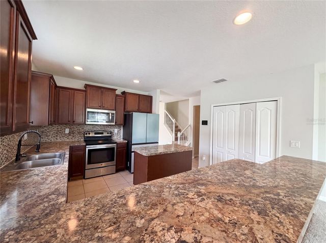 4876 GRASSY KNOLL DRIVE, Tavares, FL 32778