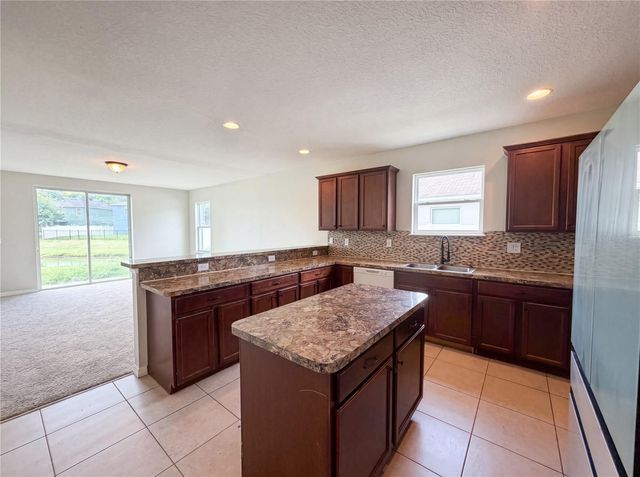 4876 GRASSY KNOLL DRIVE, Tavares, FL 32778