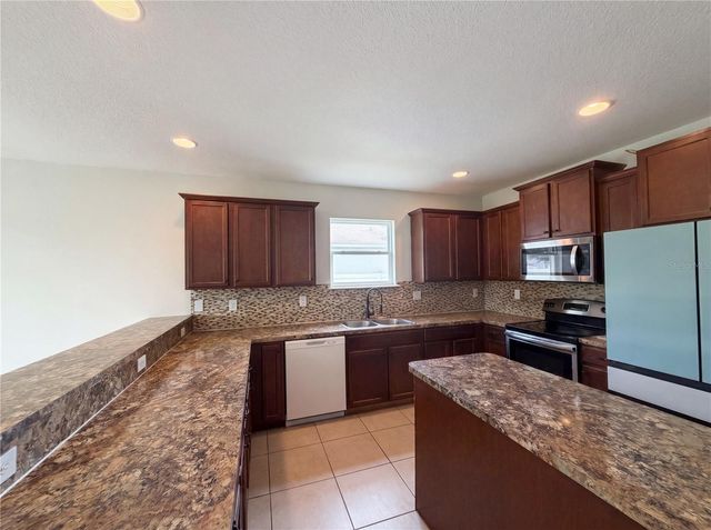 4876 GRASSY KNOLL DRIVE, Tavares, FL 32778