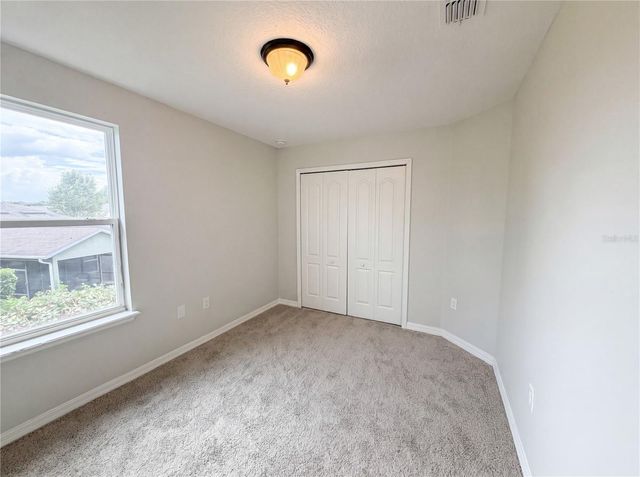 4876 GRASSY KNOLL DRIVE, Tavares, FL 32778