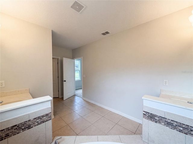 4876 GRASSY KNOLL DRIVE, Tavares, FL 32778