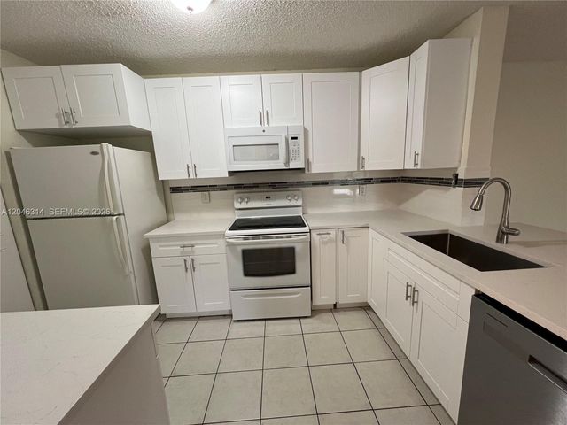 11277 W Atlantic Blvd 302, Coral Springs, FL 33071
