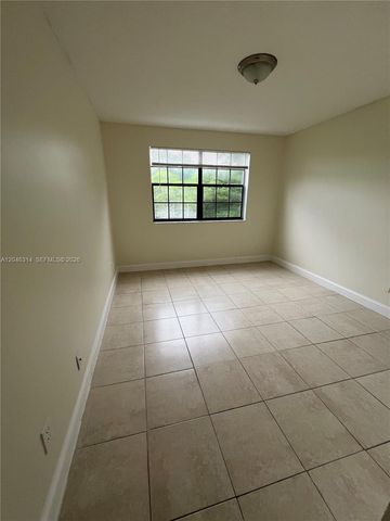 11277 W Atlantic Blvd 302, Coral Springs, FL 33071
