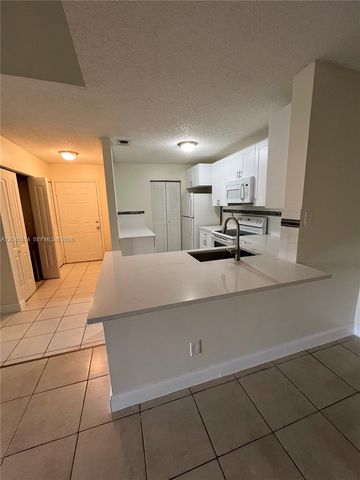 11277 W Atlantic Blvd 302, Coral Springs, FL 33071