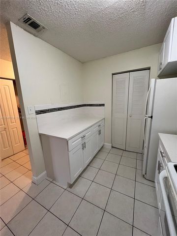 11277 W Atlantic Blvd 302, Coral Springs, FL 33071