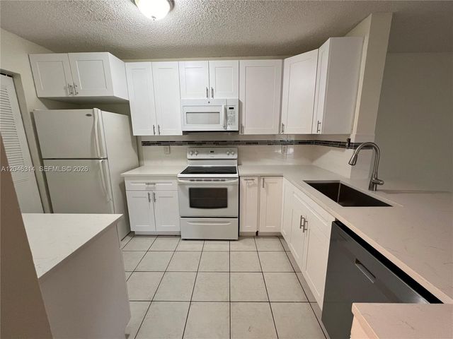 11277 W Atlantic Blvd 302, Coral Springs, FL 33071