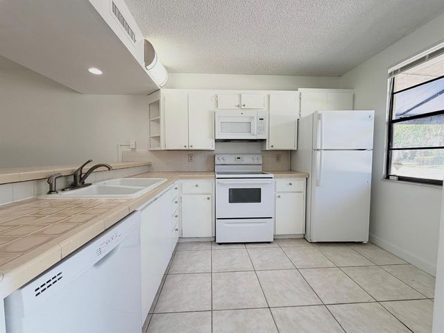 3511 Village Boulevard Unit 103, West Palm Beach, FL 33409