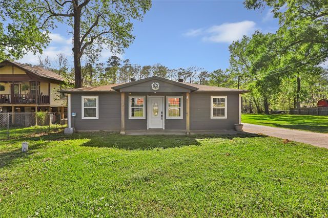 218 Waterfall Drive, Huffman, TX 77336