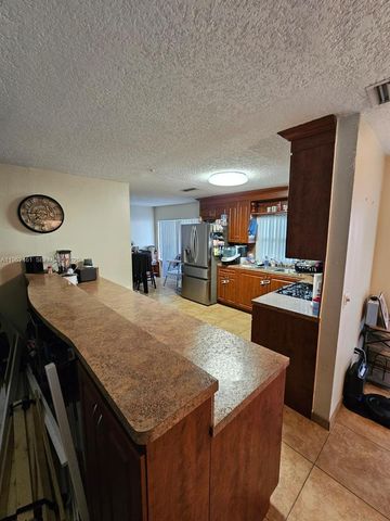 9161 NW 26th Pl, Sunrise, FL 33322