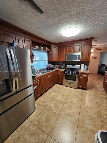 9161 NW 26th Pl, Sunrise, FL 33322