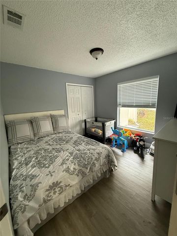 7736 ROLLINGRIDGE COURT, Orlando, FL 32835